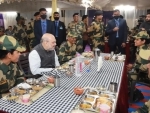 Amit Shah having dinner with BSF personnel at BSF camp in Jaisalmer