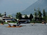 A tourist enjoying water skiing in Kashmir's Dal Lake