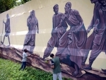 Artists painting on walls as part of Azadi Ka Amrit Mahotsav in Agartala