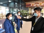 Passengers undergo thermal screening at Patna airport