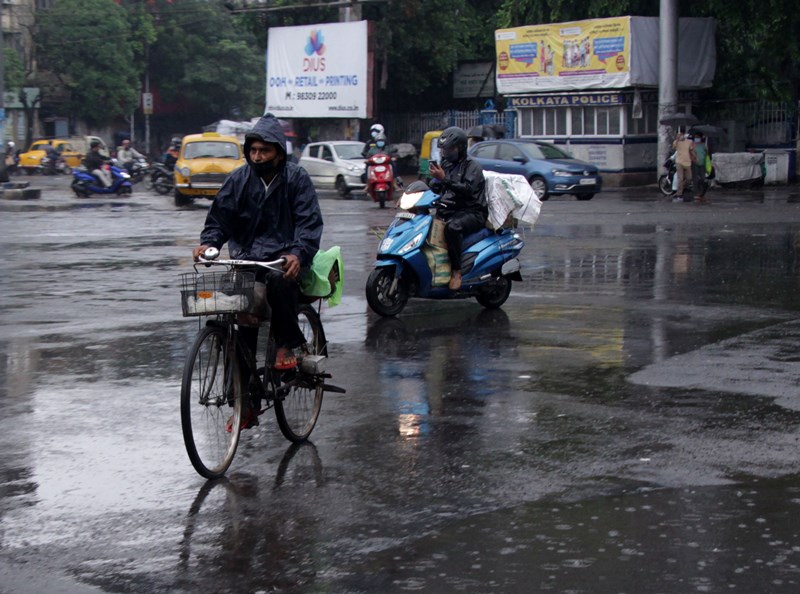 Glimpses of rain splashed Kolkata roads