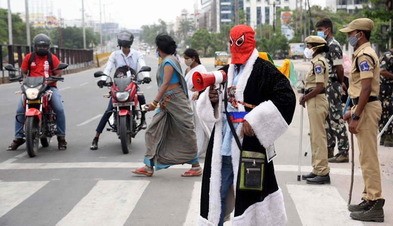 Man in spiderman attire requests motorists to obey Covid protocol in Hyderabad