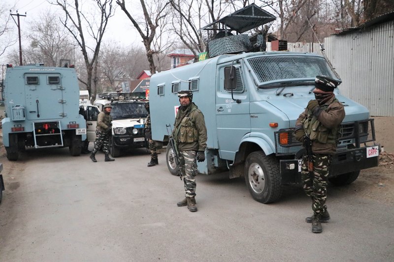 Security personnel takes position during encounter with terrorists in J&K's Pulwama