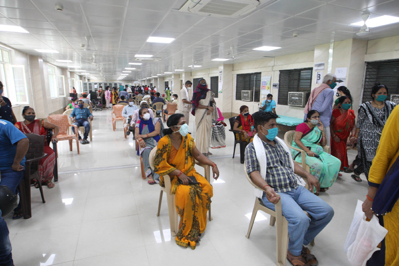 Prayagraj: People waiting for a dose of COVID-19 vaccine