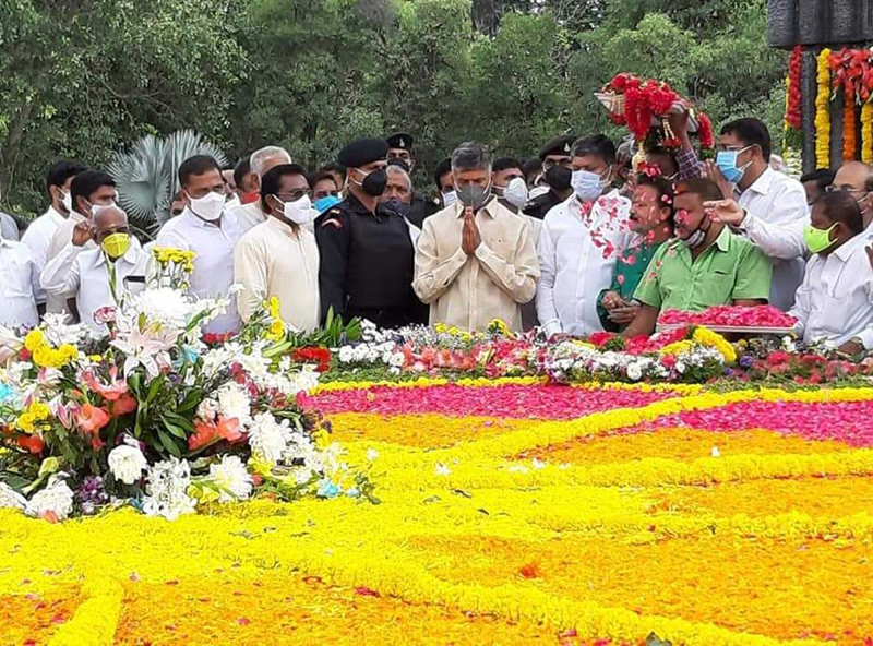 TDP supremo Chandara Babu Naidu pays floral tribute to ex-Andhra Pradesh CM N T Rama Rao on his birth anniversary
