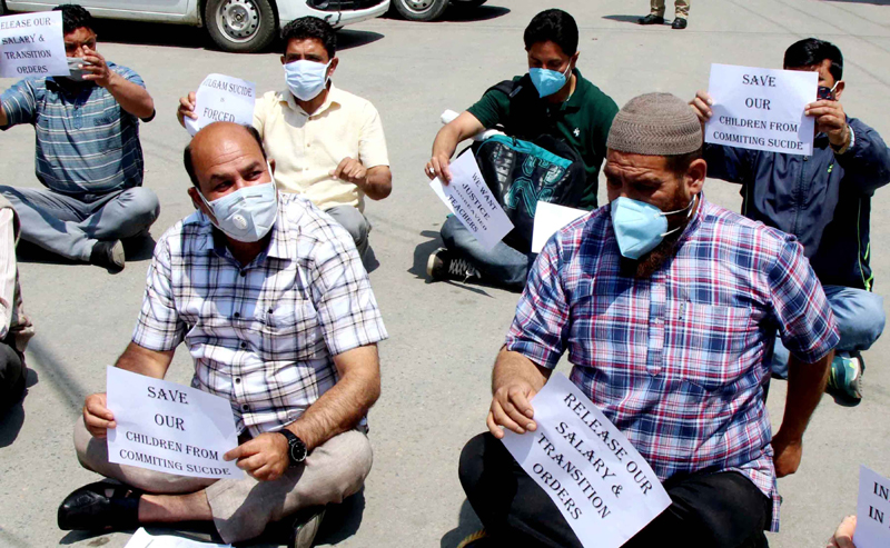 JK Employees Joint Action Committee members demonstrate in Srinagar