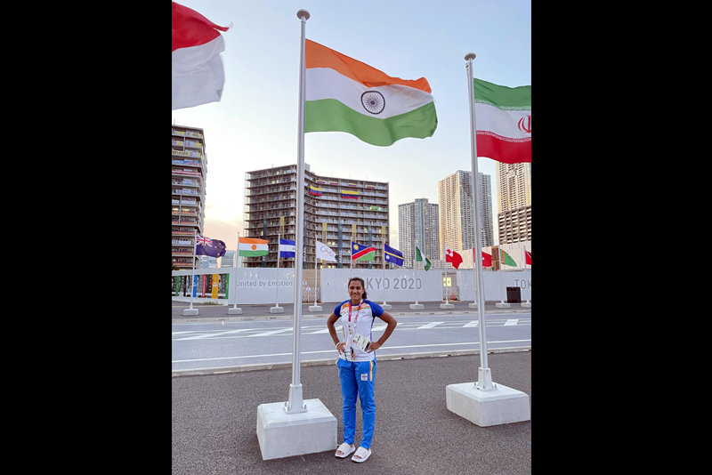 Indian Womens Hockey Team Captain, Rani Rampal poses with tricolour in Tokyo Olympic Games Village