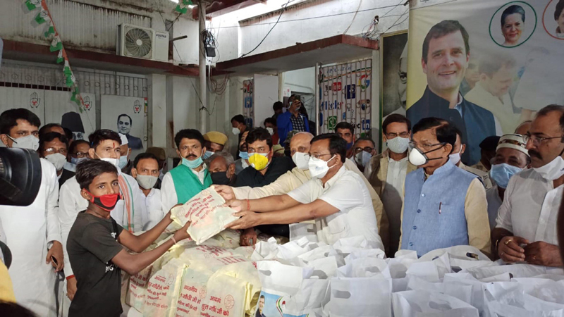 Congress state president Madan Mohan Jha distribute COVID-19 relief kits in Patna
