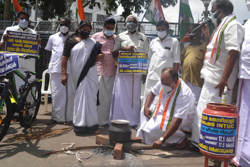 Motor workers federation (INTUC) protesting against fuel price hike outside Kerala Secretariat