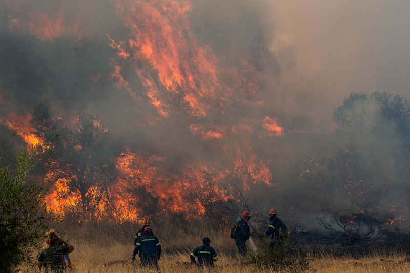 Firefighters battle a blaze in Vilia