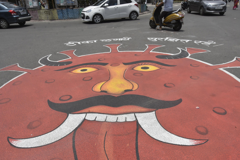 A graffiti in Ranchi depicts alert for Covid third wave