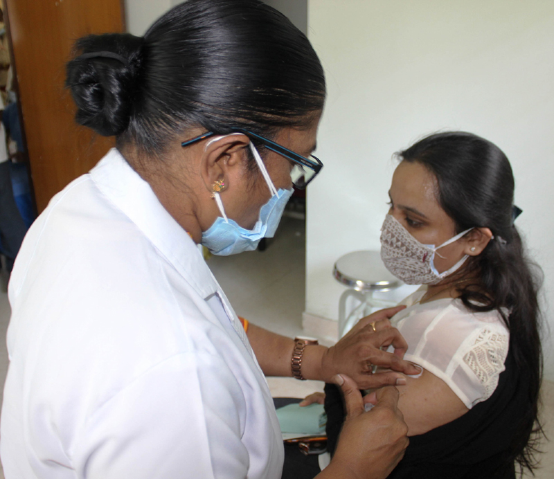 A woman receiving Covid19 vaccine in Hyderabad