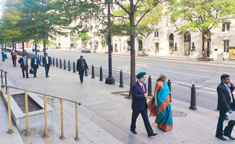 Nirmala Sitharaman with ambassador Taranjit Singh Sandhu walking through the streets of Washington DC