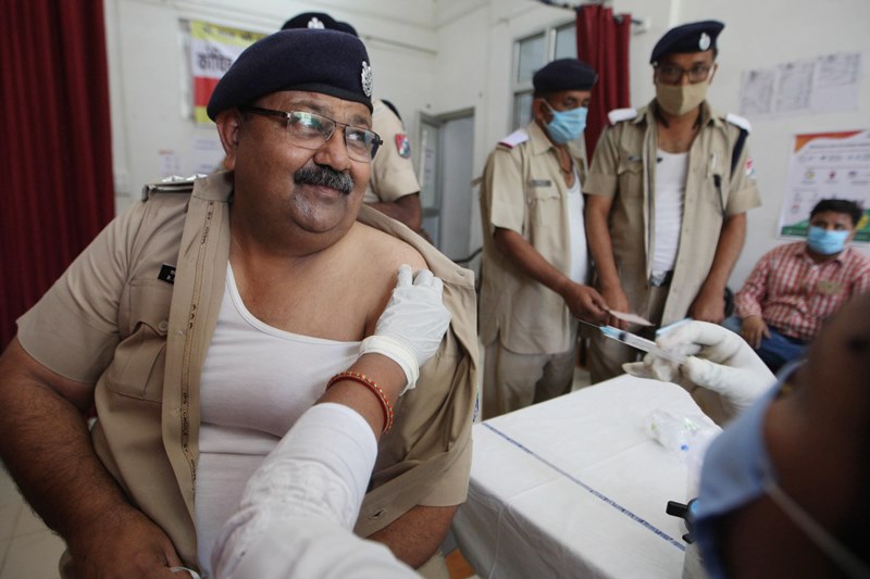 Officer receiving COVID-19 vaccine in Prayagraj