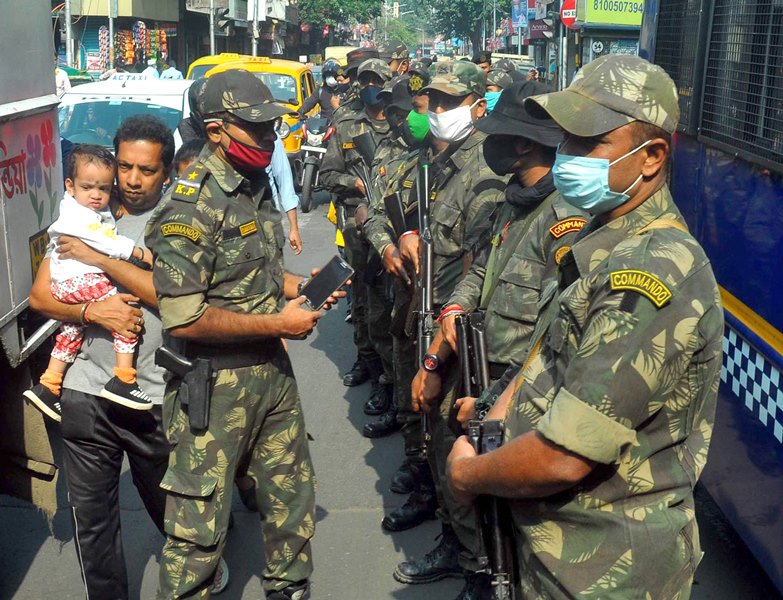 Police patrolling at a street on the eve of the KMC election in Kolkata