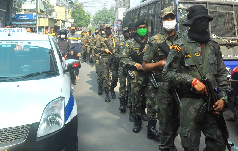 Police patrolling at a street on the eve of the KMC election in Kolkata
