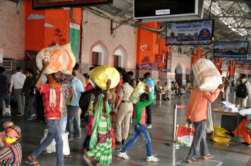 Passengers arrive at Lucknow's Charbagh Railway Station amid Covid lockdown