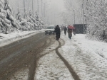 Fresh snowfall covers surroundings of Kashmir's Baramulla