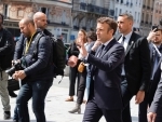 Emmanuel Macron greets crowd in Paris