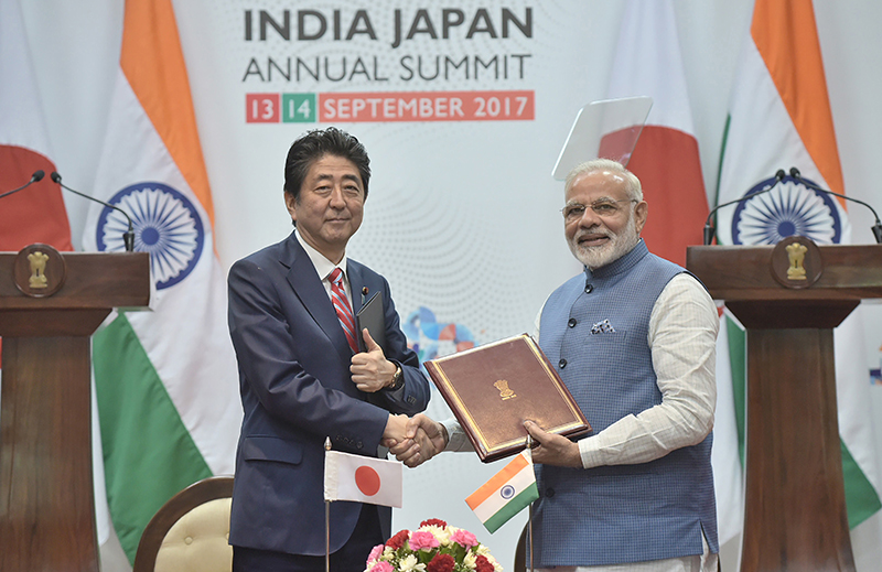 File photos of ex-Japanese PM Shinzo Abe with PM Modi during former's India visit in Sept 2017