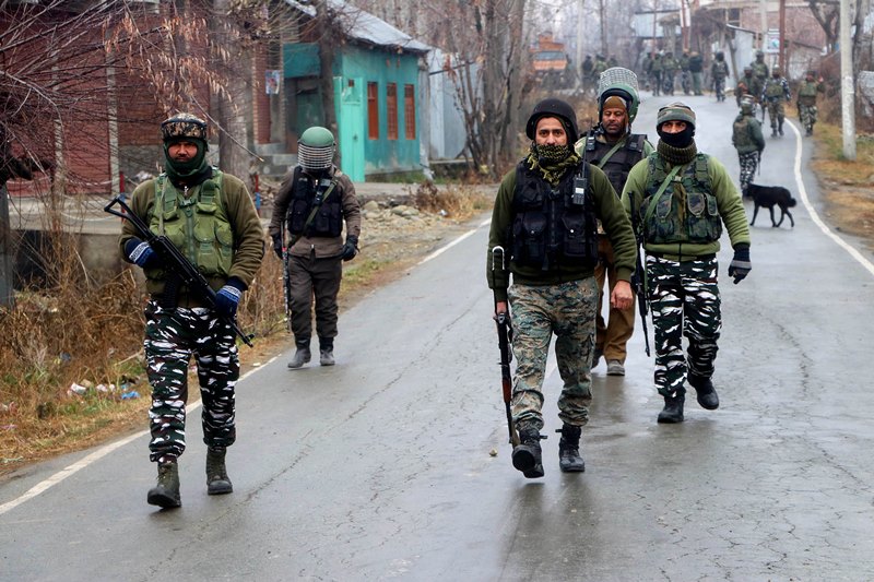 Security personnel flash victory sign after eliminating two LeT terrorists in J&K's Kulgam