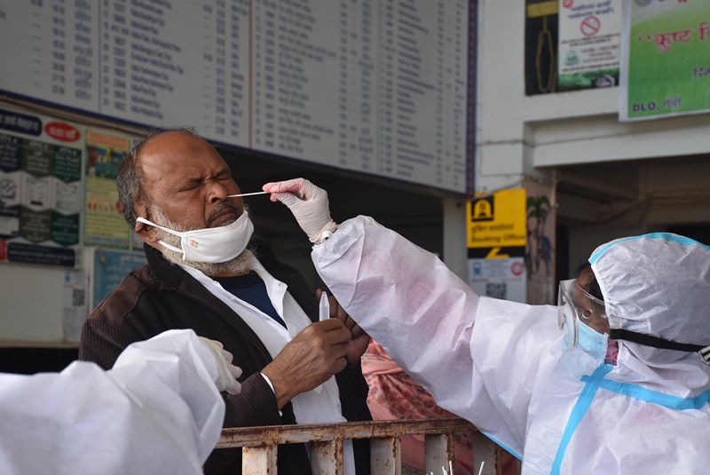 Health workers collecting swab sample in Ranchi station
