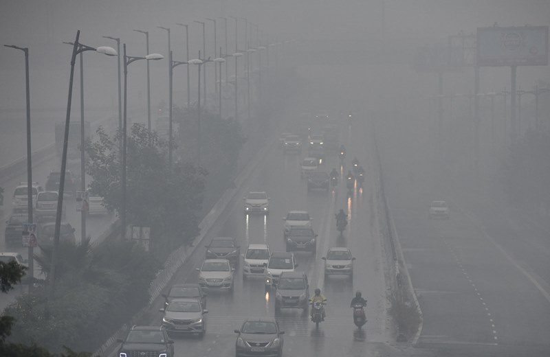Low visibility in Delhi from winter drizzle