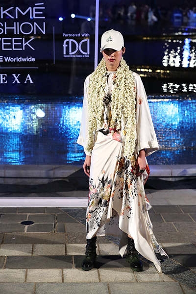 Models showcase designer Anamika Khanna's line of clothing at the Lakme Fashion Week