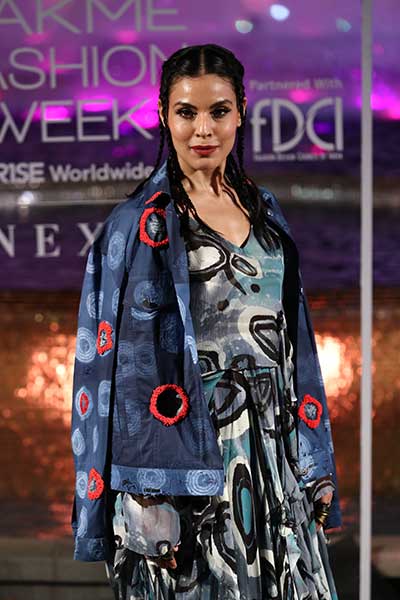 Models showcase designer Anamika Khanna's line of clothing at the Lakme Fashion Week