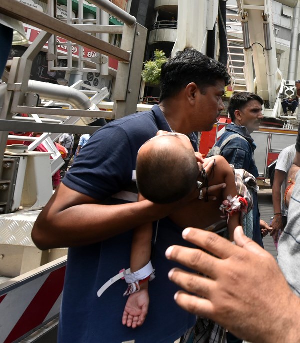 Firefighters rescue child patients after fire breaks out at Ahmedabad hospital