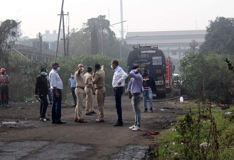 Officials clearing the site of chemical leak from tanker in Gujarat's Surat