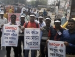 Members of State Bank of India Contractual Workers Association participate in Kolkata rally