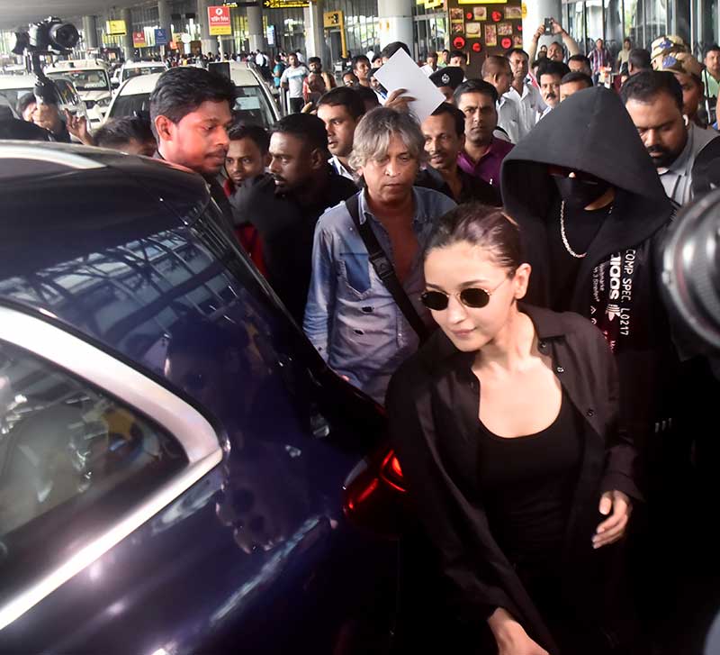 Twinning in black Ranveer and Alia arrive in Kolkata to promote Rocky Aur Rani Kii Prem Kahaani