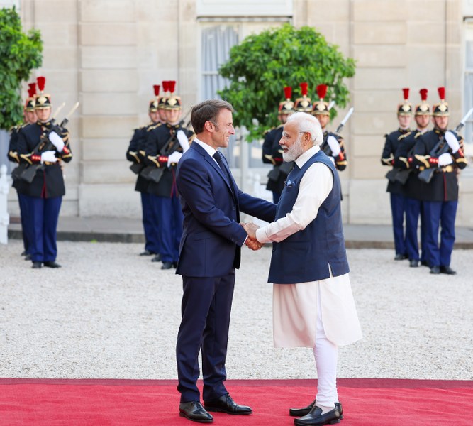 PM Modi welcomed by French Prez Emmanuel Macron at Elysee Palace in Paris