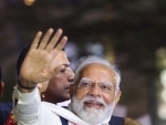 PM Modi waves at crowd in Guwahati