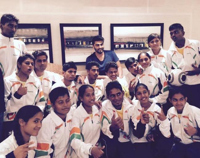 Arjun Kapoor spends time with slum dwellers amidst shooting for Slum Soccer