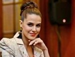 Actress Neha Dhupia urges fans to watch MTV Roadies
