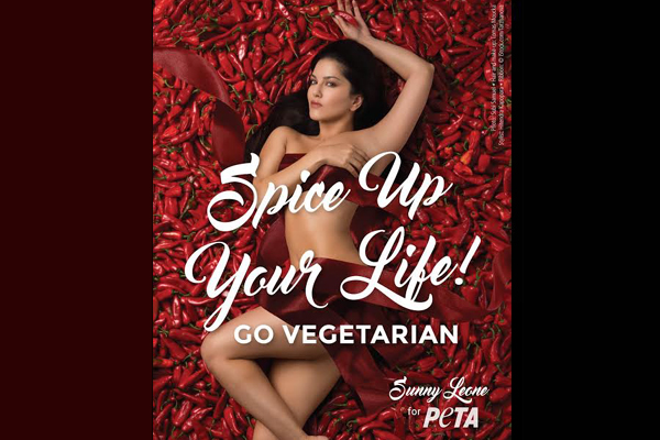 Lying on a lush bed of spicy red chillies, Sunny Leone looks exotic in new PETA ad