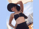Karishma Kapoor sizzles in black bikini