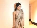 Karisma Kapoor looks ravishing in monotone dove-grey sari, posts images on social media