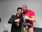 Varun Dhawan shares images with WWE stars Sasha Banks, Triple H