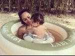 Lisa Haydon gives first swim lesson to her baby boy