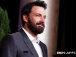 Actor Ben Affleck helps girlfriend pick out shoes in designer store