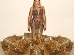 Beyonce looks stunning in golden gown designed by Indian Designers Falguni Shane Peacock