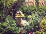 Sunny Leone relaxes in garden, shares image on social media