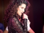 Sunny Leone looks sensational in her curly hair avatar