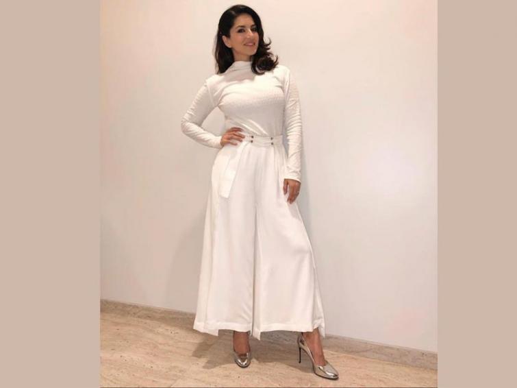 Sunny Leone looks stunning in white dress, shares images online