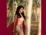 Sunny Leone wears a T-shirt which call her the 'social media queen', shares image for her fans
