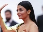 On her first appearance, Ash glams up Cannes red carpet in golden ensemble