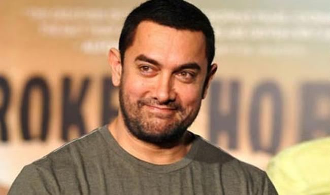 Video of Aamir Khan traveling in economy class of a flight goes viral on social media
